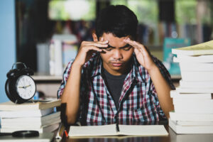 Academic Burnout – Student feeling mentally exhausted due to study stress and academic pressure